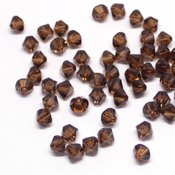  Биконусы Swarovski Smoked Topaz
